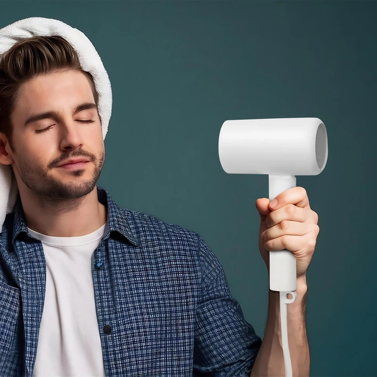 سشوار مسافرتی شیائومی مدل Compact Hair Dryer با طراحی تاشو و فناوری یون منفی